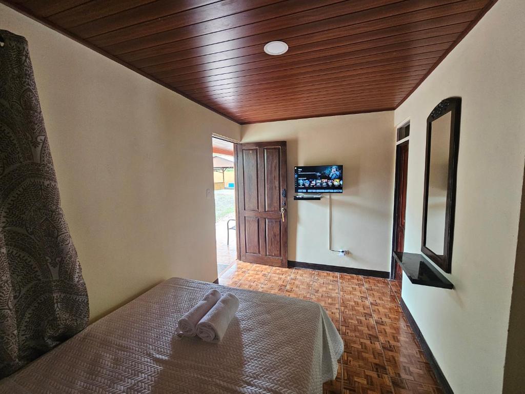 Postel nebo postele na pokoji v ubytování Hotel Luna Liberiana
