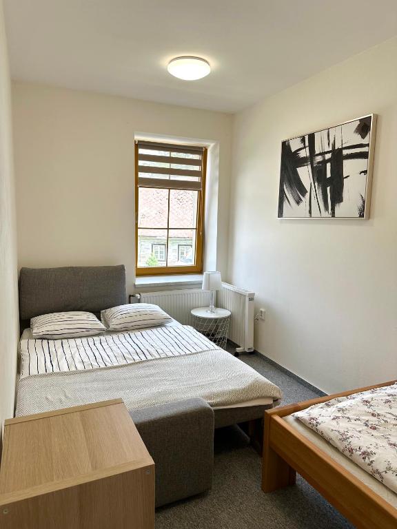 Voodi või voodid majutusasutuse Apartmán na sjezdovce toas