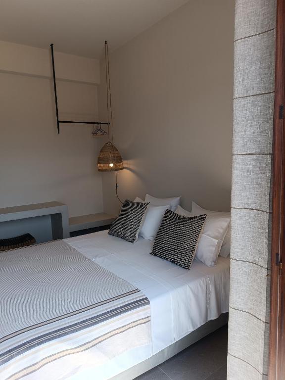 Postel nebo postele na pokoji v ubytování Petra Lodge