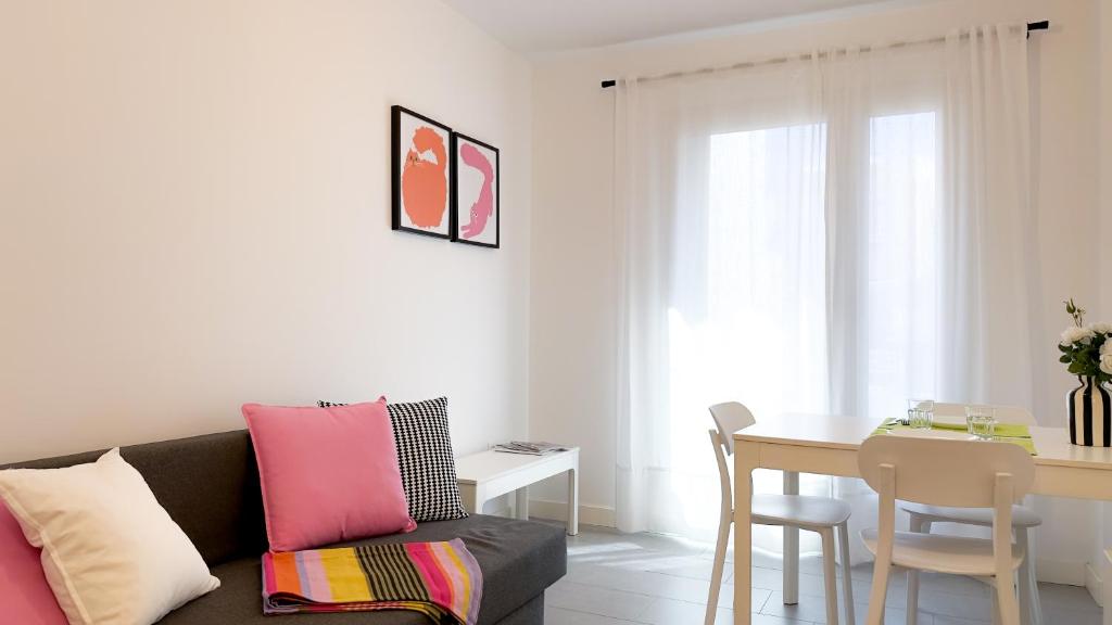 a living room with a couch and a table at El Salvador 53 in Las Palmas de Gran Canaria