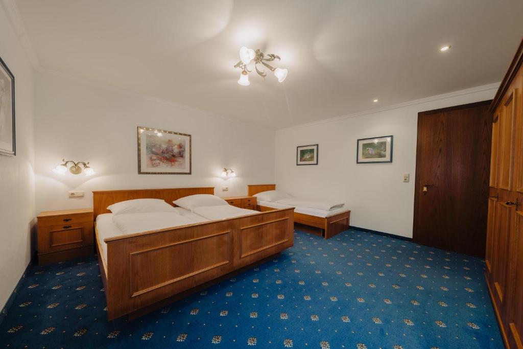 Postel nebo postele na pokoji v ubytování Peak View Appartements