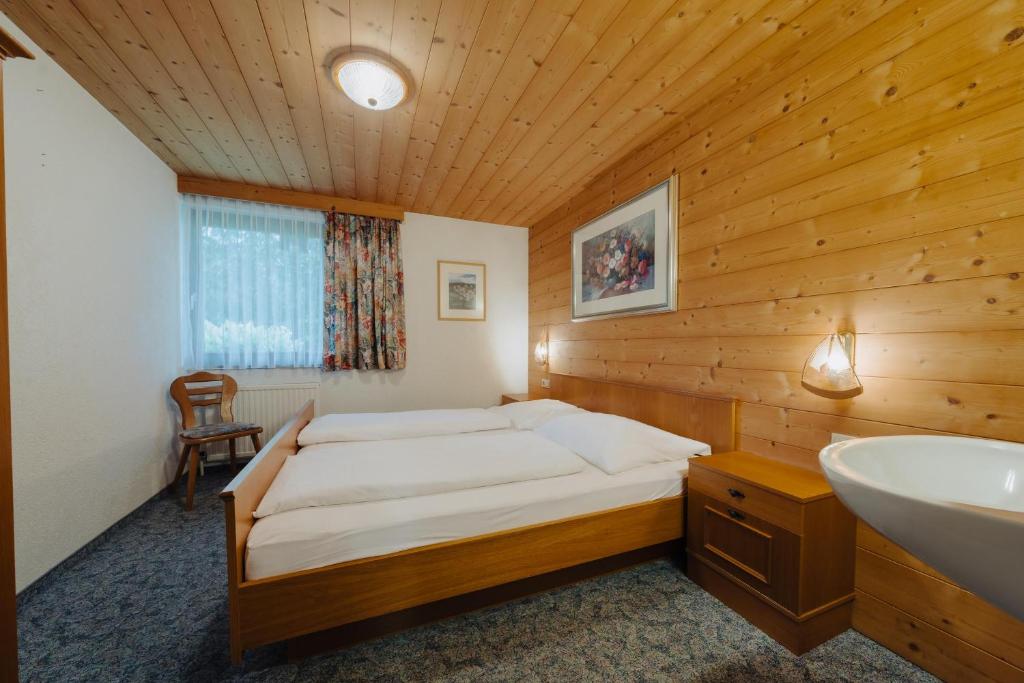 Postel nebo postele na pokoji v ubytování Peak View Appartements