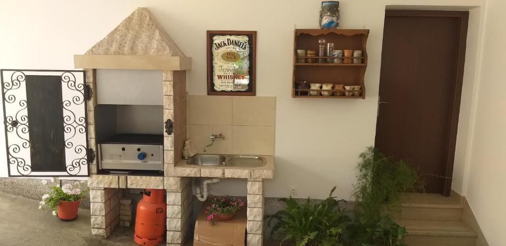 TV a/nebo společenská místnost v ubytování Studio Apartment Oliva