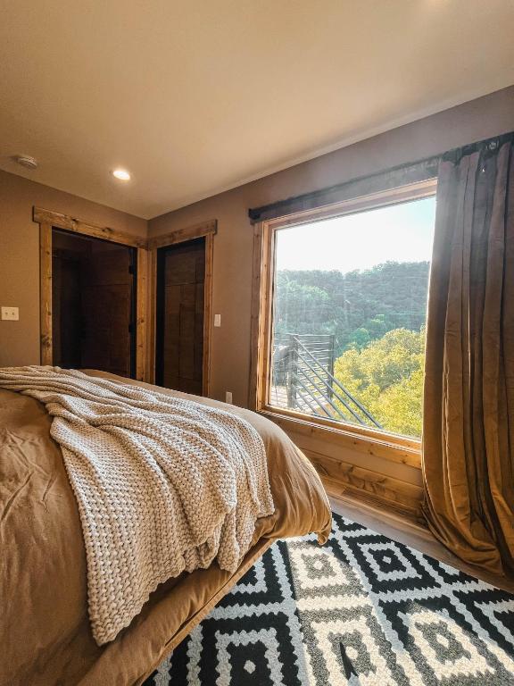 Postel nebo postele na pokoji v ubytování Long View Resort Bryson City, NC