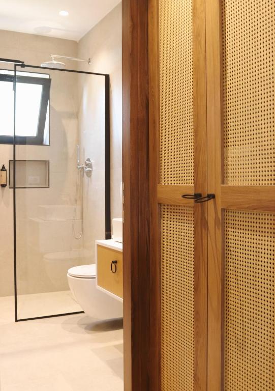 Koupelna v ubytování NOIMA Hotel & Suites