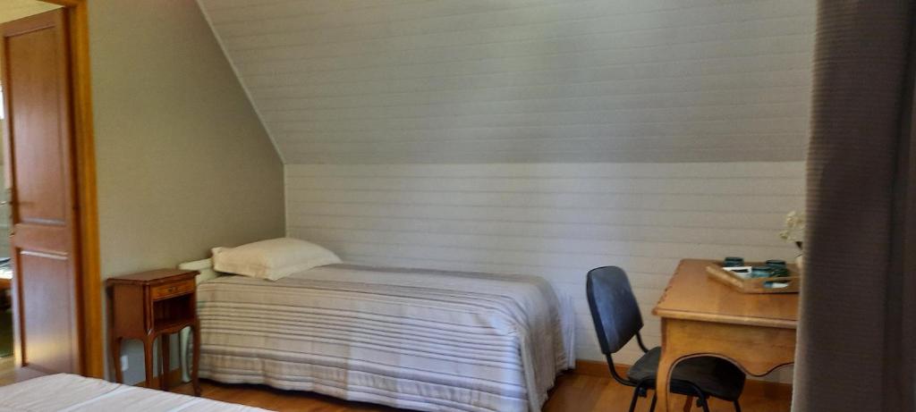 Postel nebo postele na pokoji v ubytování Chambres d'hôtes Chez Dumitra