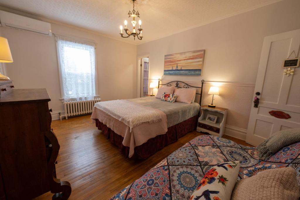 Postel nebo postele na pokoji v ubytování À Tout Venant B&B