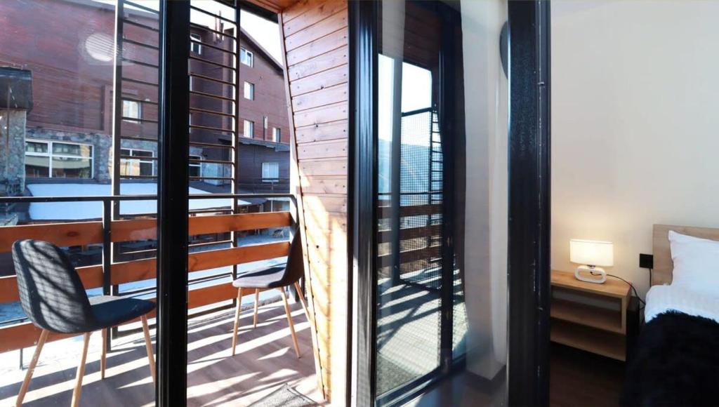 Postel nebo postele na pokoji v ubytování Apartment in Marshall Gudauri Project