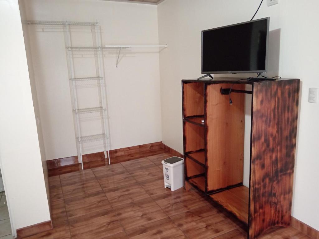 TV a/nebo společenská místnost v ubytování Posada Rural Río Celeste