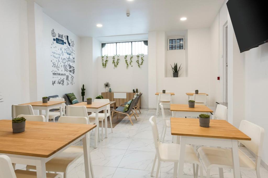 Posezení v ubytování Madalena Hostel e Suites