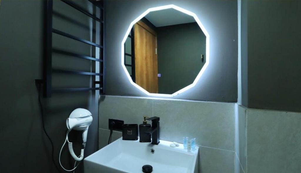 Koupelna v ubytování Cozy Studio Apartment in Marshall Gudauri Project