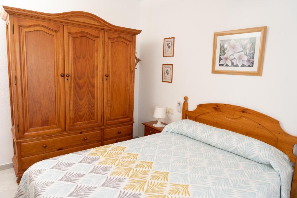 Łóżko lub łóżka w pokoju w obiekcie Casa la Buganvilla-Mojácar Playa