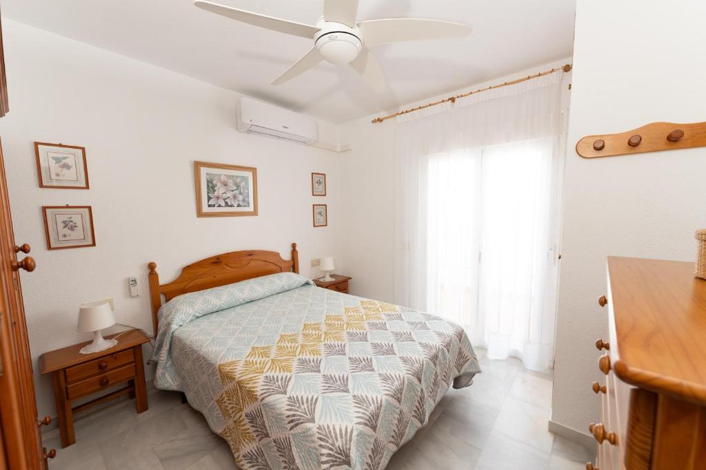 Łóżko lub łóżka w pokoju w obiekcie Casa la Buganvilla-Mojácar Playa