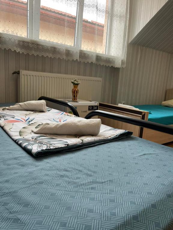 Postel nebo postele na pokoji v ubytování VIP hotel