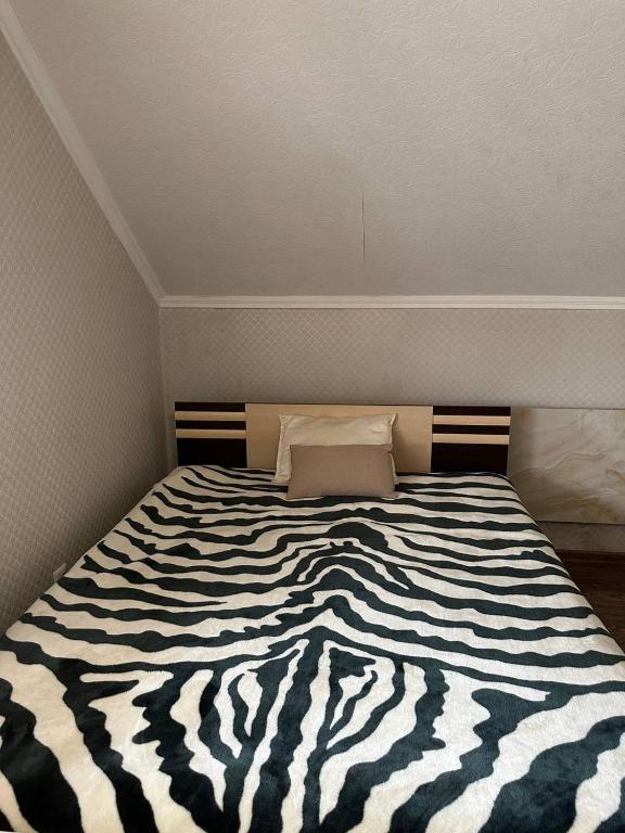 Postel nebo postele na pokoji v ubytování VIP hotel