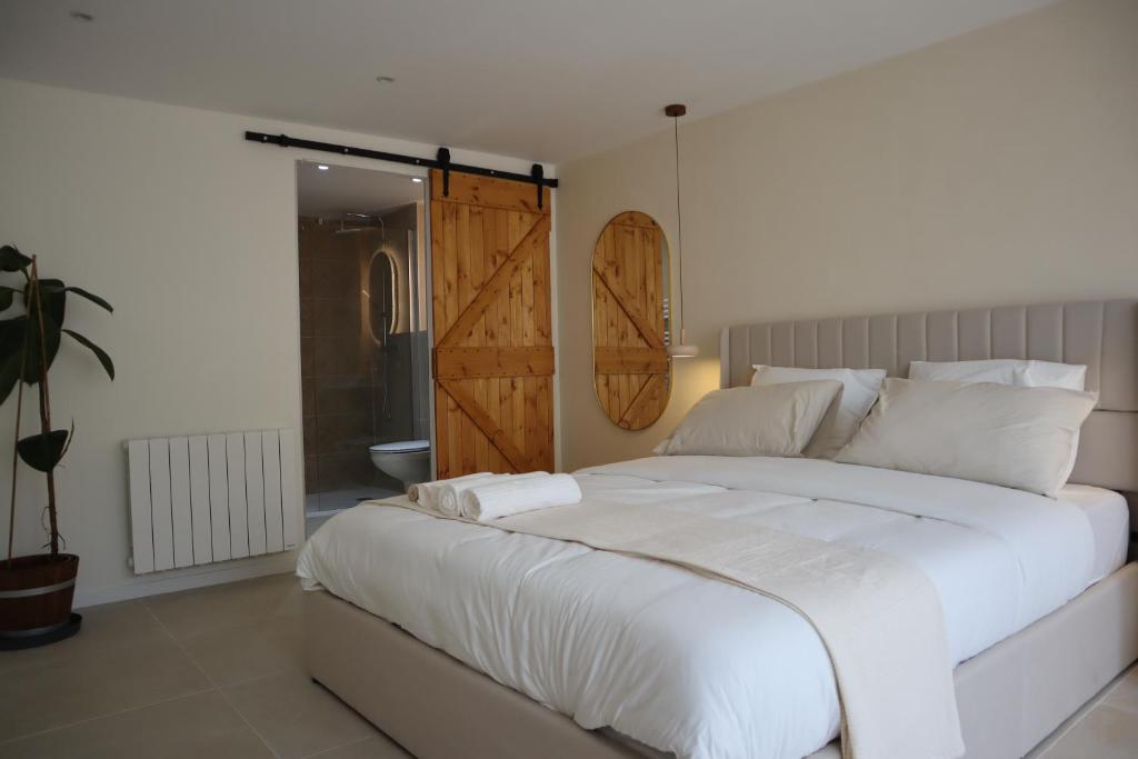 Postel nebo postele na pokoji v ubytování Suite l'Aparté