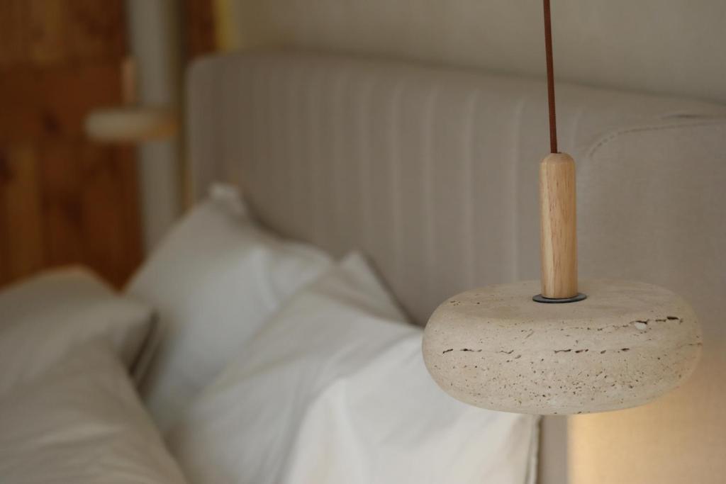Postel nebo postele na pokoji v ubytování Suite l'Aparté