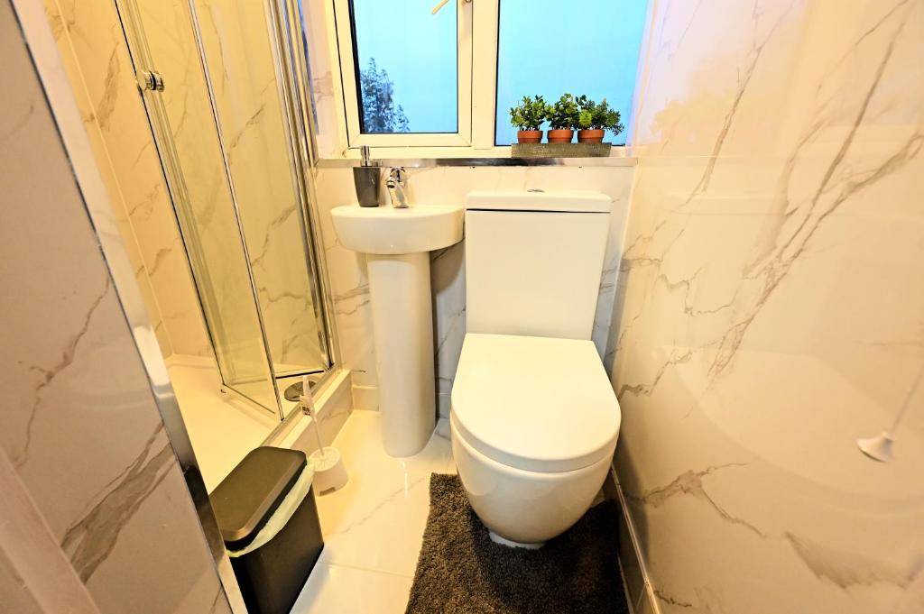 Koupelna v ubytování Ensuite Near Luton Station