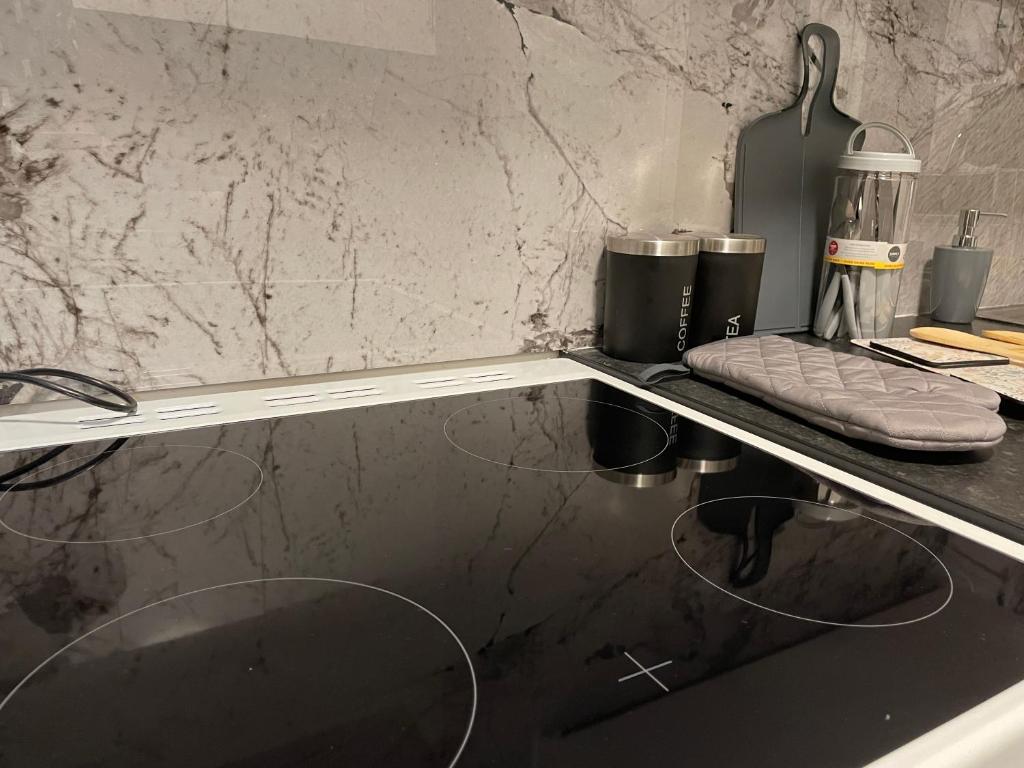 Kuchyň nebo kuchyňský kout v ubytování Serenity Luton Suite Near Mall