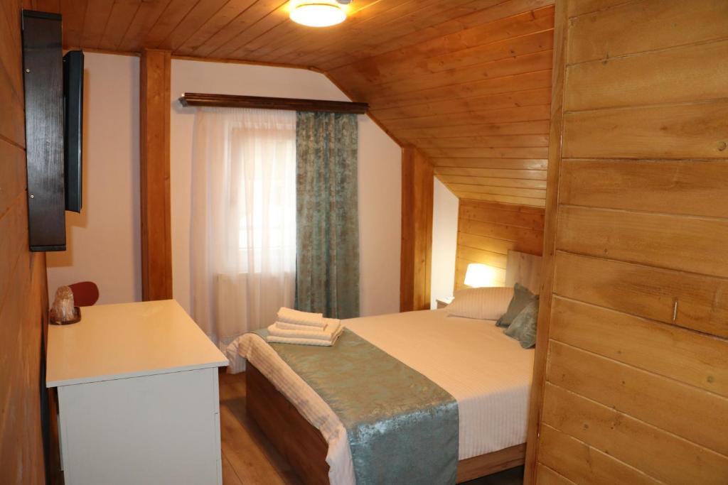 Postel nebo postele na pokoji v ubytování Casa Camelia