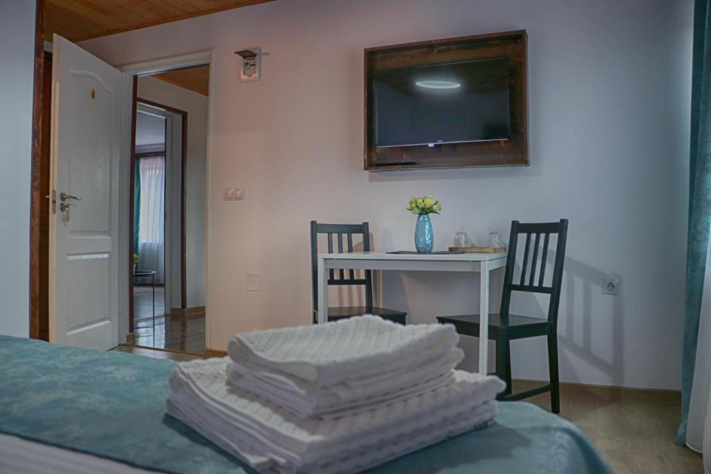 Postel nebo postele na pokoji v ubytování Casa Camelia