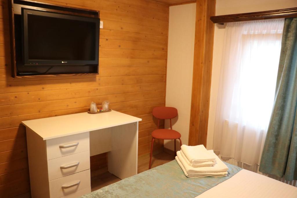 Postel nebo postele na pokoji v ubytování Casa Camelia