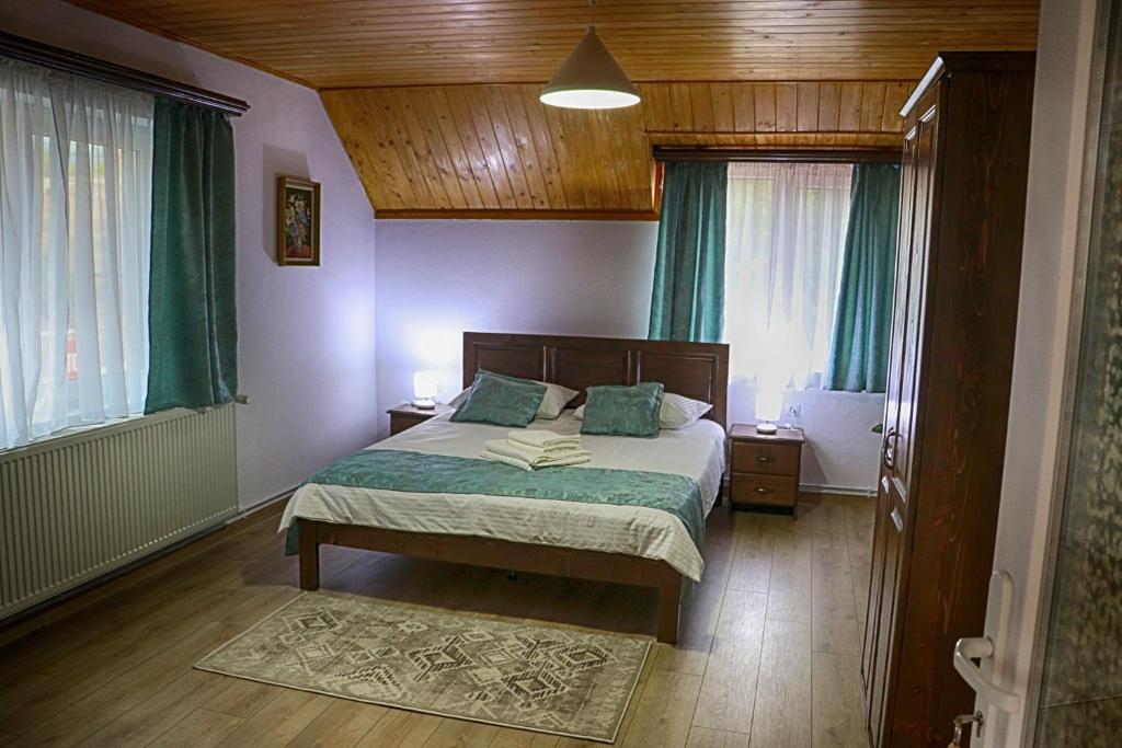Postel nebo postele na pokoji v ubytování Casa Camelia