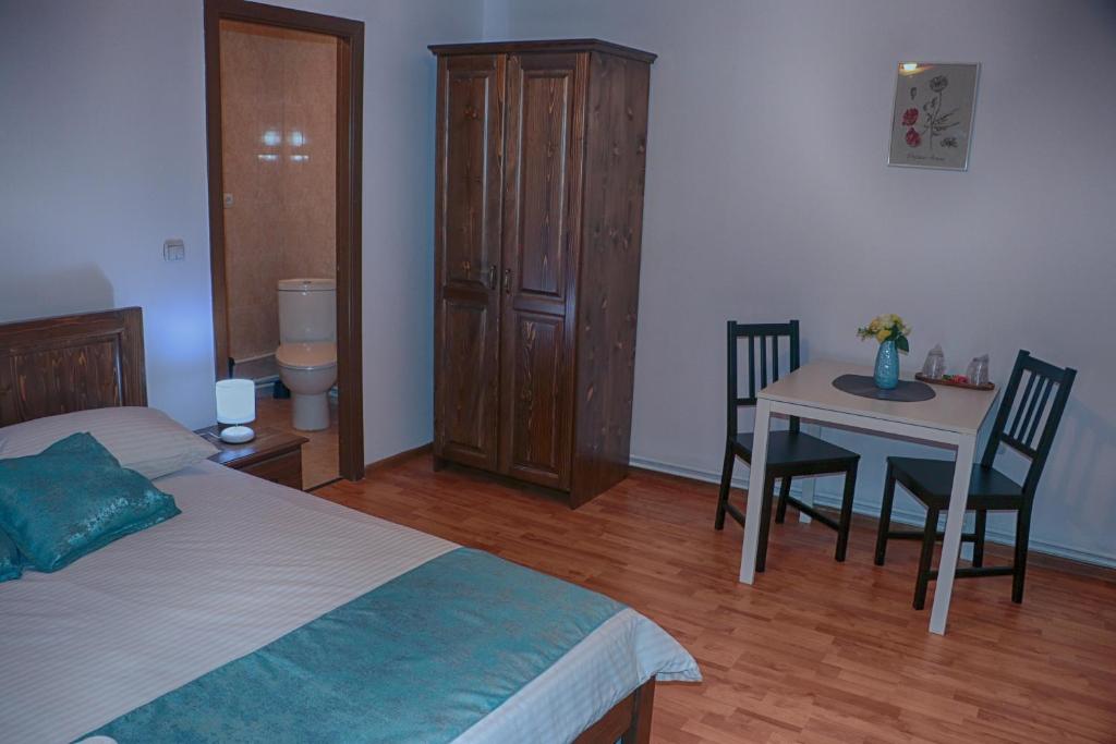 Postel nebo postele na pokoji v ubytování Casa Camelia
