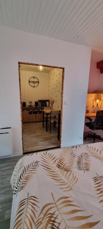 Postel nebo postele na pokoji v ubytování L'hirondelle
