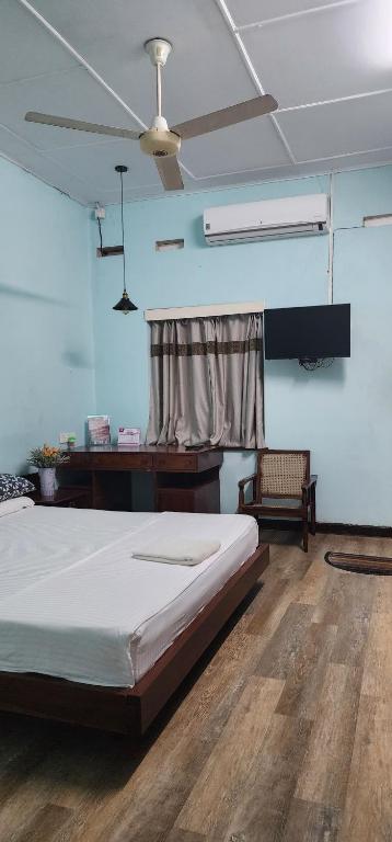 Postel nebo postele na pokoji v ubytování CHARAKAMA Guest Bungalow - GAMPAHA