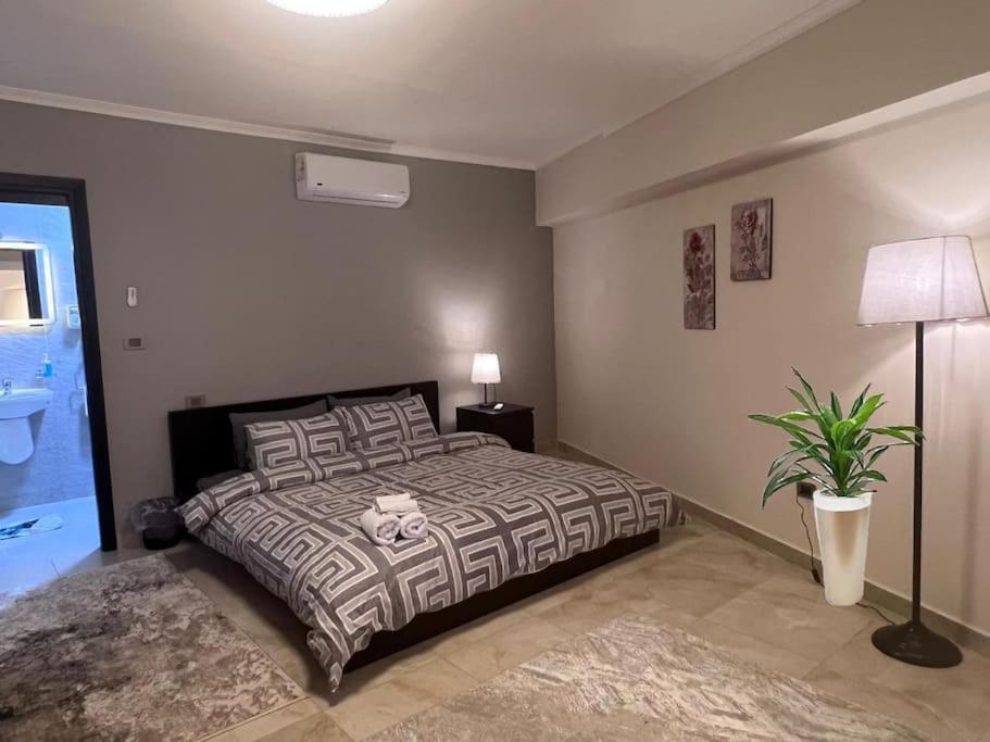 Postel nebo postele na pokoji v ubytování Luxurious Studio