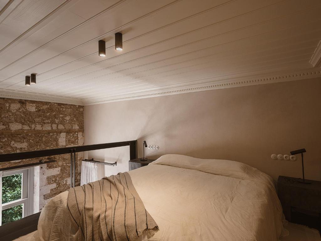Postel nebo postele na pokoji v ubytování Aisha Hotel