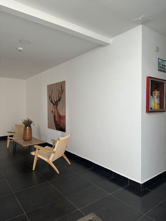 Posezení v ubytování Hotel Puerto Triunfo