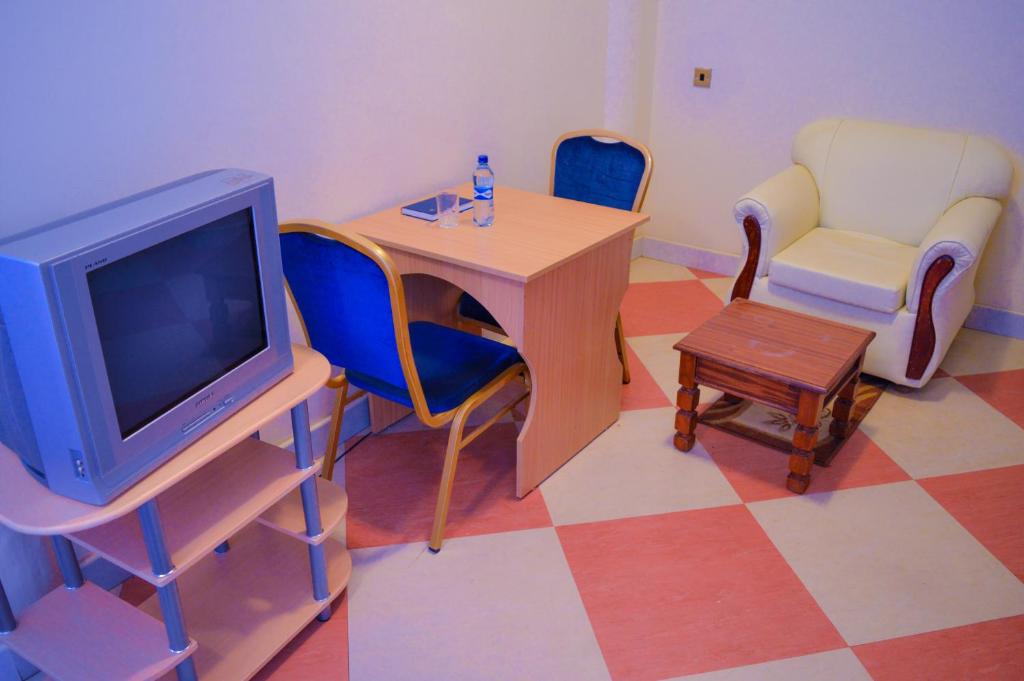 TV a/nebo společenská místnost v ubytování Stardom Hotel