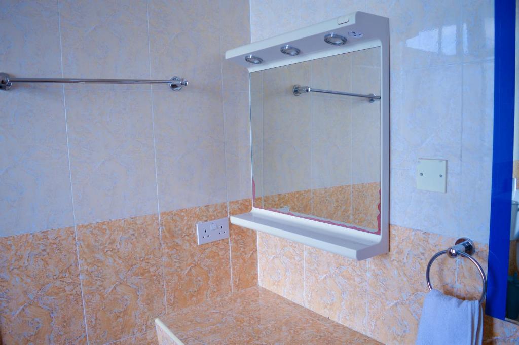 Koupelna v ubytování Stardom Hotel