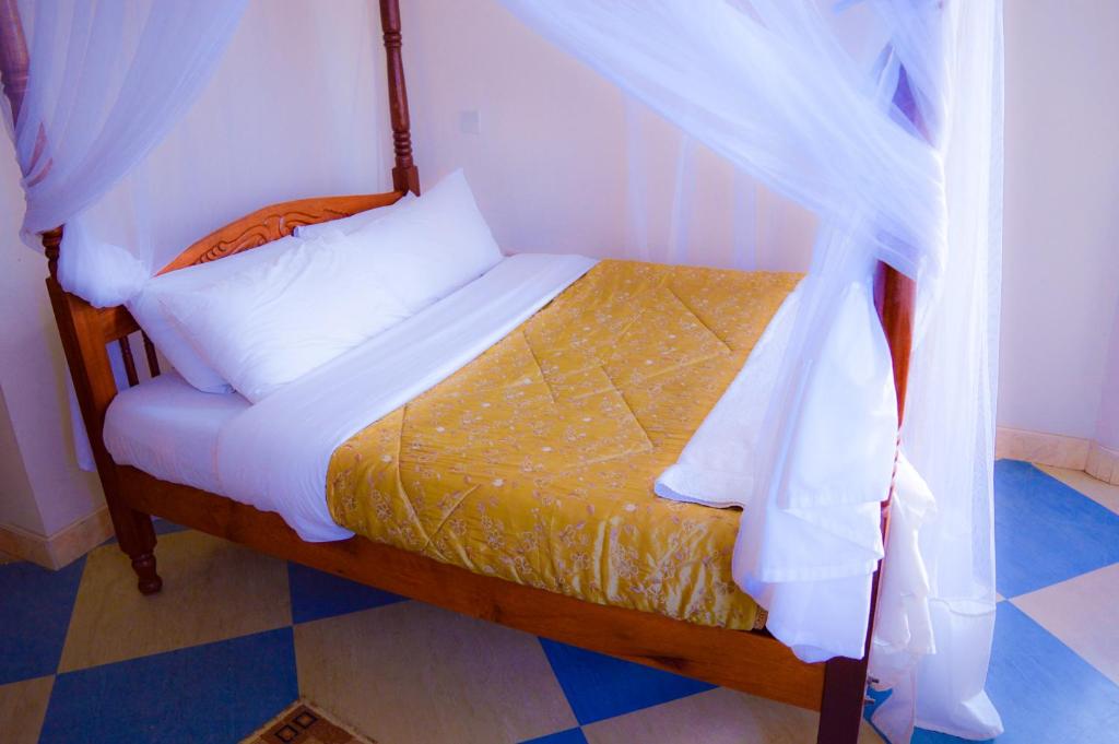 Postel nebo postele na pokoji v ubytování Stardom Hotel