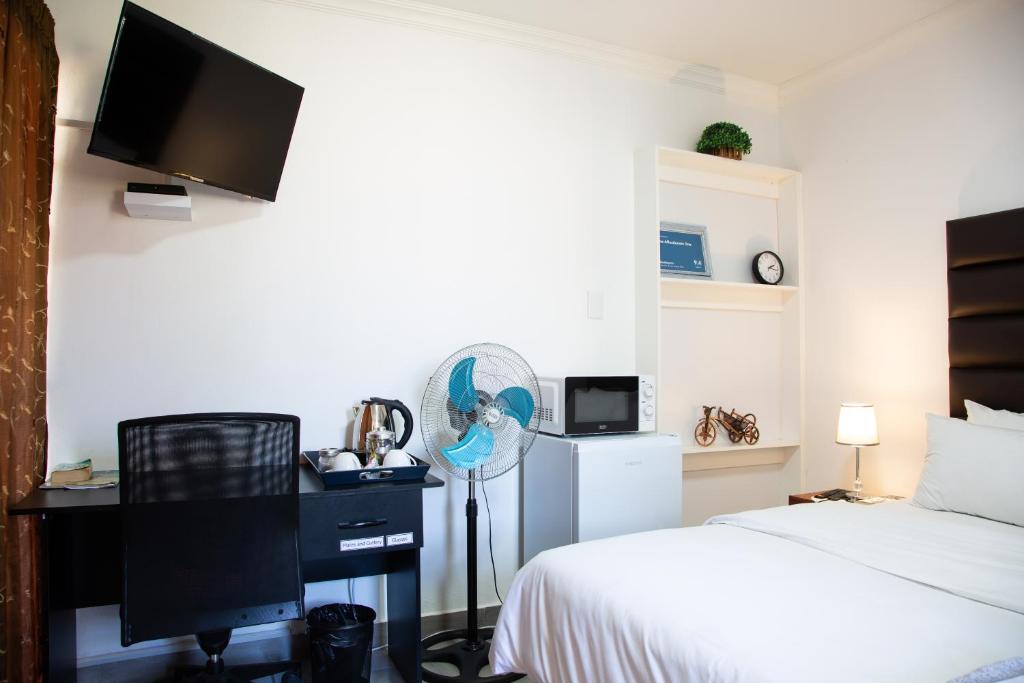 Letto o letti in una camera di The Affectionate One