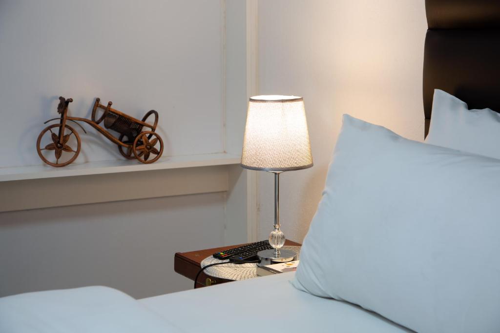 Letto o letti in una camera di The Affectionate One