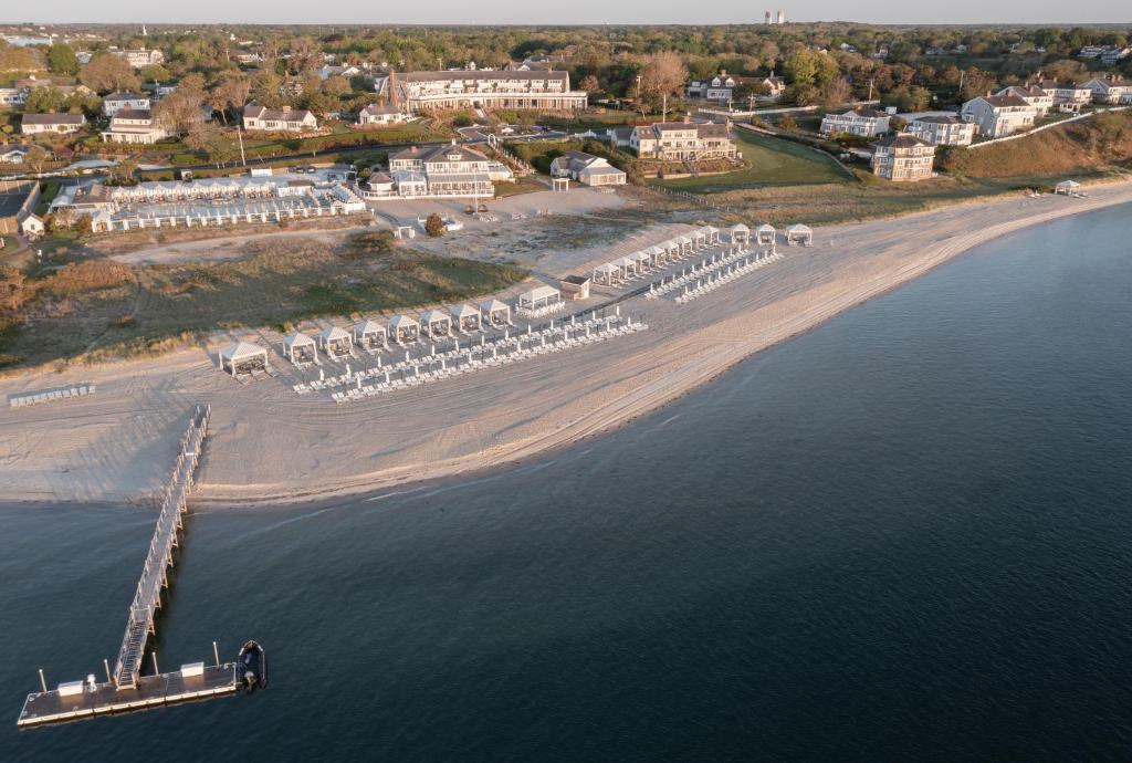an aerial view of a beach with a pier at Chatham Bars Inn in Chatham