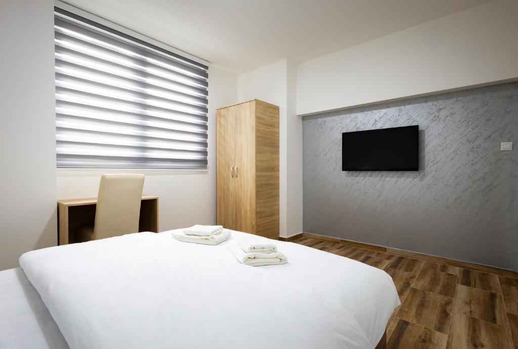 Postel nebo postele na pokoji v ubytování Restoran & Motel Manjež
