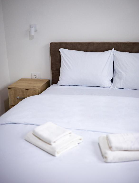 Postel nebo postele na pokoji v ubytování Restoran & Motel Manjež