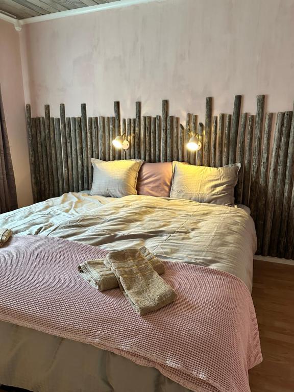 Postel nebo postele na pokoji v ubytování Backens Gästhem