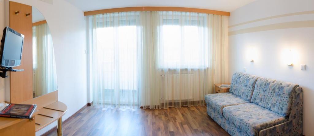 TV a/nebo společenská místnost v ubytování Garni Hotel Sonnleitenhof