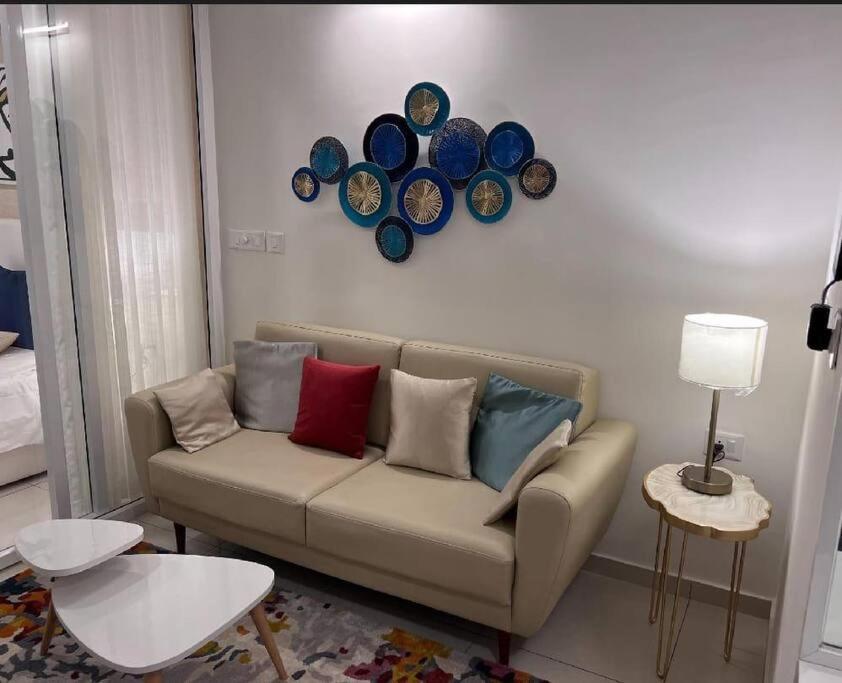 Un lugar para sentarse en Cozy 1 bhk near Aster Hospital