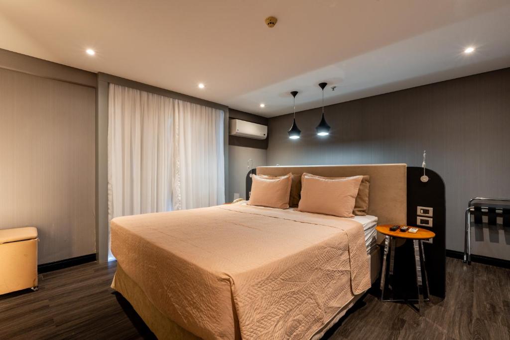 Postel nebo postele na pokoji v ubytování Suíte Grand Luxo Brasília