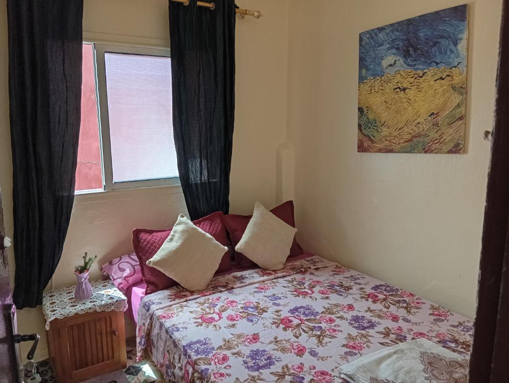 Postel nebo postele na pokoji v ubytování Dar Al Taaj