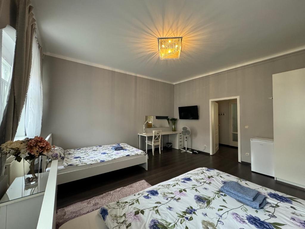 Postel nebo postele na pokoji v ubytování Apartments Oschatz