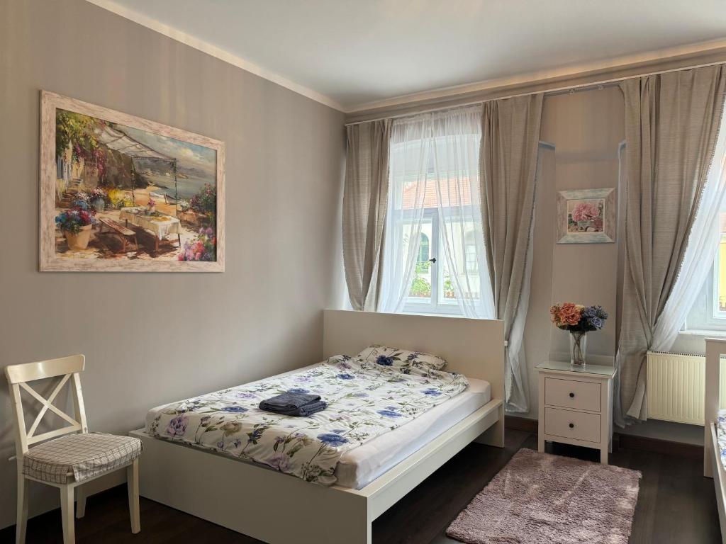 Postel nebo postele na pokoji v ubytování Apartments Oschatz