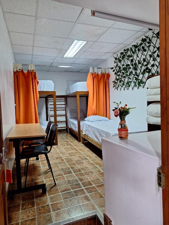 Postel nebo postele na pokoji v ubytování Casa Wayra Cajamarca