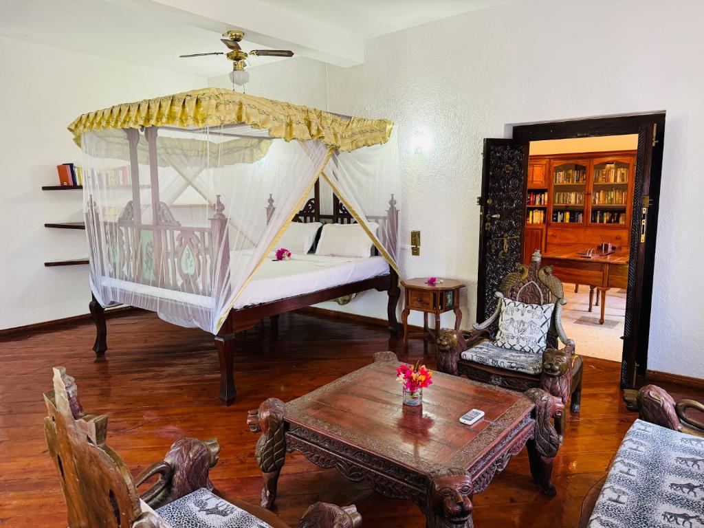 Postel nebo postele na pokoji v ubytování Watamu Villaggio